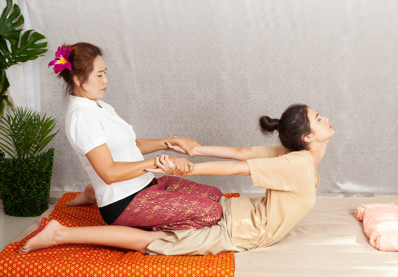 Thai massage back stretch at home